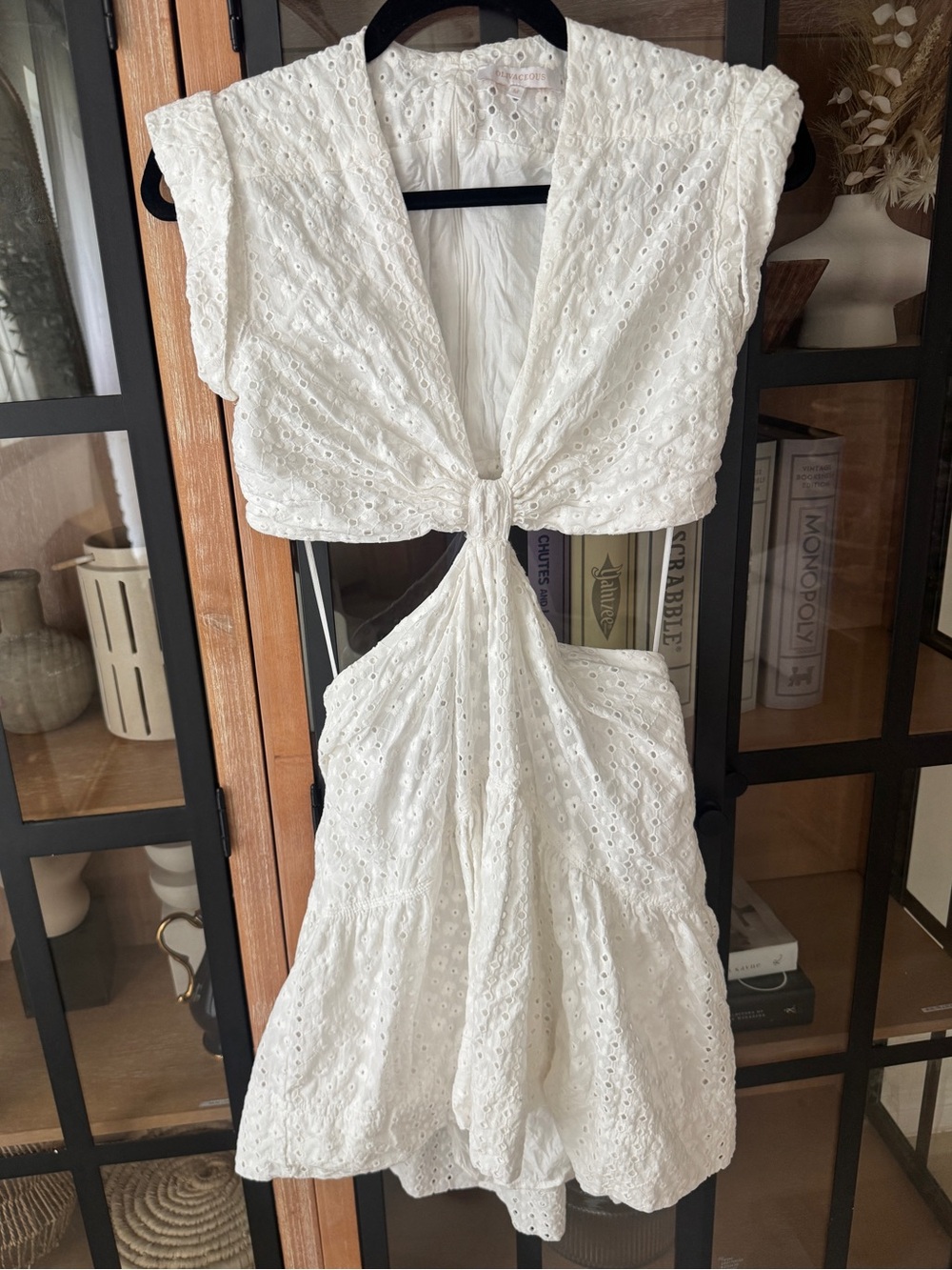 Olivaceous eyelet mini dress knotted cap sleeve cutouts vneck ruffle embroidered